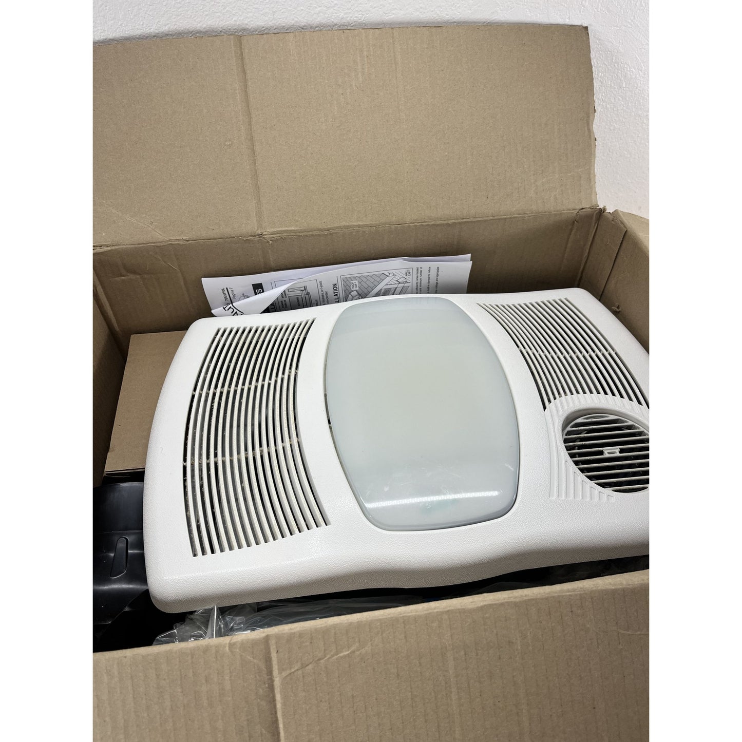 NuTone Exhaust Fan 110 CFM Ceiling Mounted With Light & 1500W Heater 765H110L