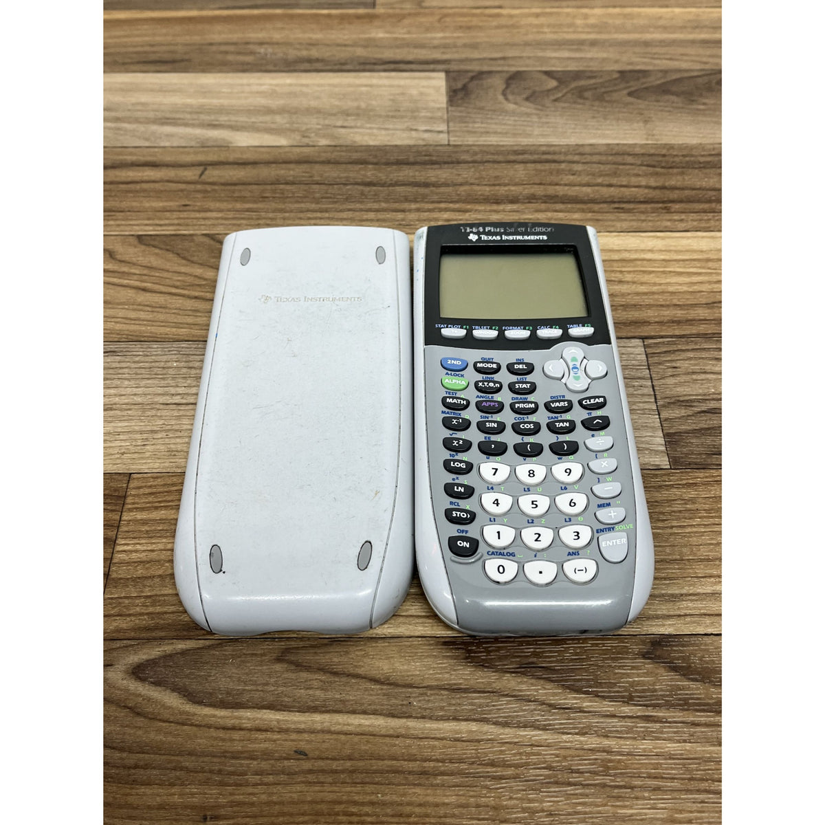 Texas Instruments TI-84 Plus Silver Edition Silver Graphing Calculator W/ Cover