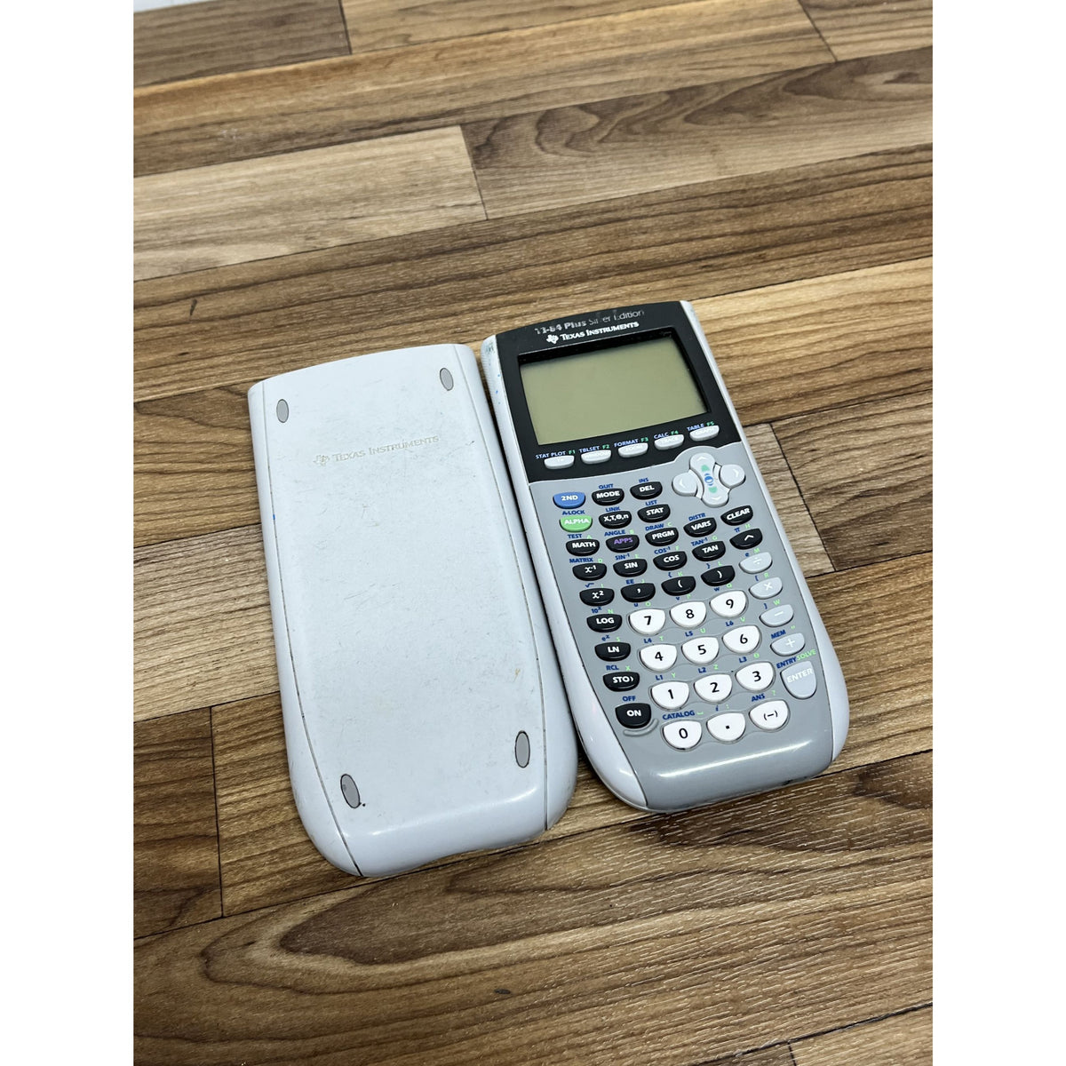 Texas Instruments TI-84 Plus Silver Edition Silver Graphing Calculator W/ Cover