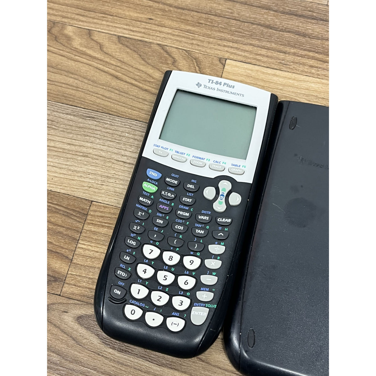 Texas Instruments TI-84 Plus Graphing Calculator and Cover Fully Working